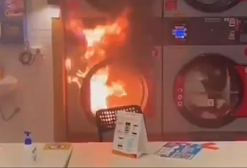 ร้านซักอบแห้ง แจงอุบัติเหตุไฟลุกเครื่องซักผ้าอัตโนมัติอบผ้า  ใช้ไฟแรงเป็นสาเหตุ